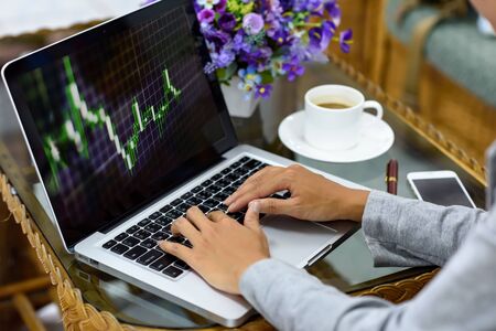 Forex trading with beautiful Asian girl. Financial Banking and Technical Concepts.の写真素材