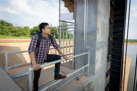 Backpackers are touring the floodgates.の写真素材