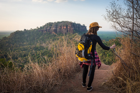 Backpackers or Hikers Female walking on the mountain.