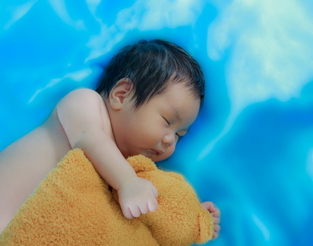 asian baby sleepingの写真素材