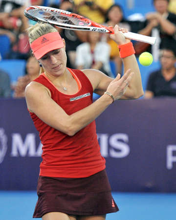 HUA HIN-JAN 1: Angelique Kerber of Germany in action during a match of WORLD TENNIS THAILAND CHAMPIONSHIP 2016 at True Arena Hua Hin on January 1, 2016 in Hua Hin, Thailandのeditorial素材