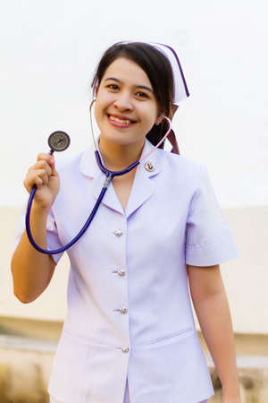 Nurse smiling with stethoscopeの写真素材