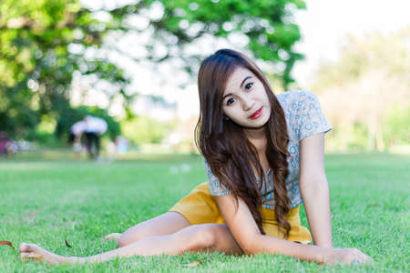 Cute woman in the parkの写真素材