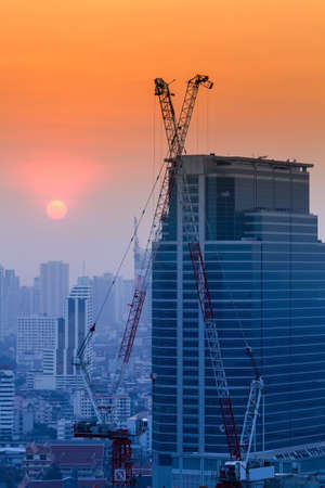Construction site at sunset, Bangkok Thailandの写真素材