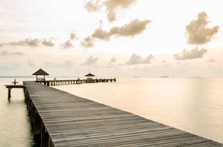 Wood jetty on the Beach and tropical sea,East of Thailand.の写真素材