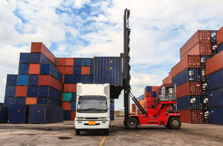 Stack of Freight Containers at the Docks with Truck の写真素材