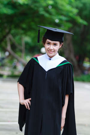 Female graduate wear graduation cap,asian womenの写真素材