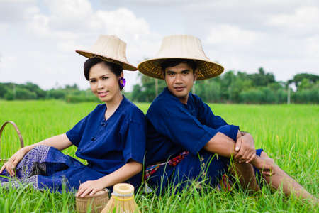 Thai farmer on rice fieldsの写真素材