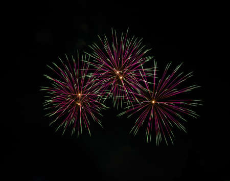 Colorful fireworks over dark skyの写真素材