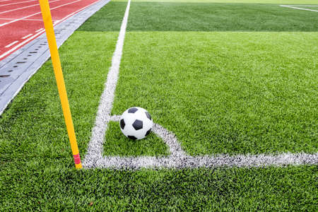 Soccer ball on soccer field の写真素材