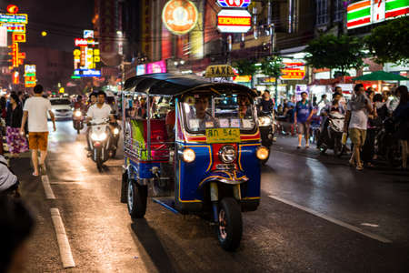 BANGKOK - DECEMBER 31  Tuk - tuk on Chinatown street at night on DEC 31, 2013 in Bangkok  There are more than 100,000  tuk-tuk  in Bangkok  のeditorial素材
