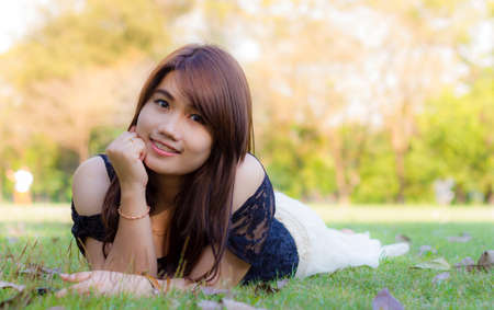Spring Girl lying on the Field  Happiness の写真素材