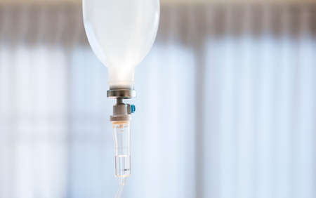 Infusion bottle with IV solution in hospital の写真素材