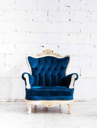 Blue classical style Armchair sofa couch in vintage roomの写真素材