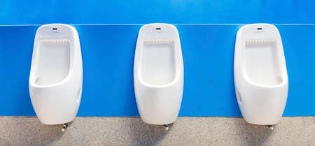 Modern restroom interior photo with urinal row の写真素材