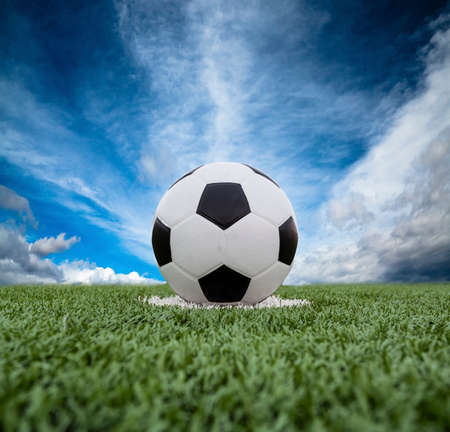 Football field soccer stadium on the green grass blue sky sport の写真素材