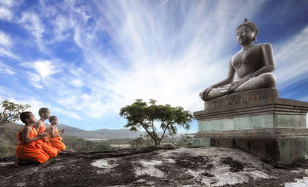SARABURI, THAILAND - MAY 12   Lord Buddha Day or Vesak Day, Buddhist monk praying to the Buddha  MAY 12,2014 in Phrabuddhachay Temple, Saraburi, Thailand のeditorial素材