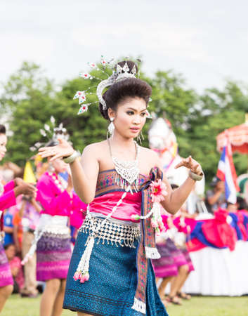 ROI-ET,THAILAND - JUNE 13   Thai ladies performing Thai dancing in Rocket festival  Boon Bang Fai  parade on June 13,2014  This festival for agriculture to celebration the raining season  のeditorial素材