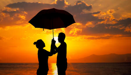 two people in love at sunsetの写真素材