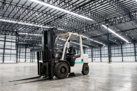 Forklift loader in large modern storehouseの写真素材