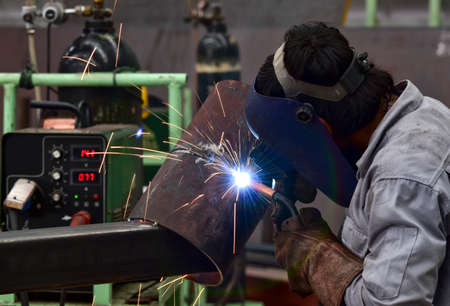 Welder in a factoryの写真素材