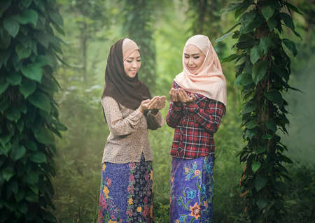 Young Woman Muslim Prayingの写真素材