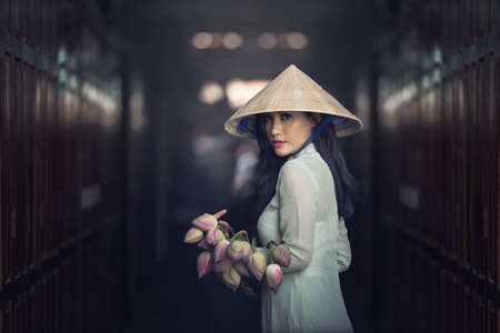 Beautiful woman with Vietnam culture traditional dress,traditional costume ,vintage style,Vietnamの写真素材