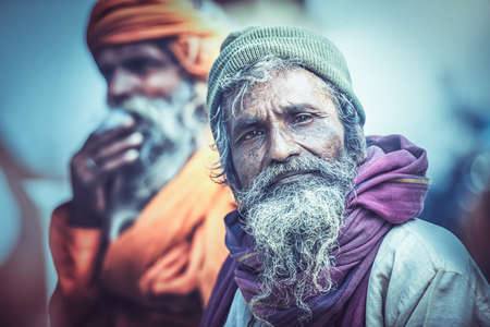 VARANASI, INDIA - February 23, 2018: Portrait of Shaiva sadhu, holy man on the ghats of the Ganges river in Varanasi, Indiaのeditorial素材