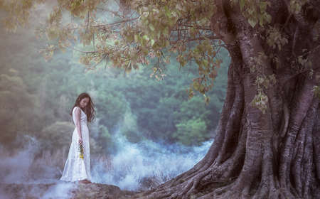 Woman with loneliness and sadness in the nature.