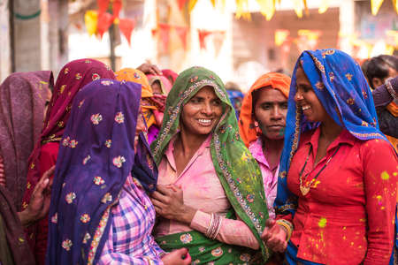 MATHURA, INDIA - Feburary 25,2018: Women in colorful sarees in the village of Agra, Indiaのeditorial素材