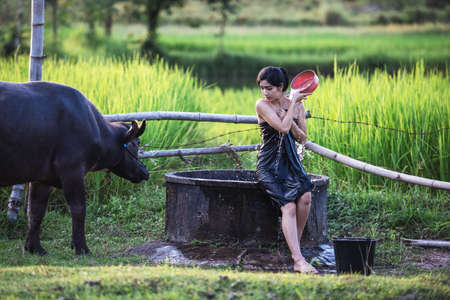 Woman Outdoor bathing, Thailand countrysideの写真素材