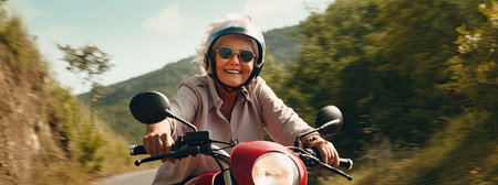 an elderly grandmother wearing a helmet drive a classic motorcycle Travel the mountain paths happilyの素材