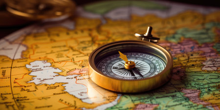 Magnetic compass and location marking with a pin on routes on world map. Adventure, discovery, navigation, communication, logistics, geography, transport and travel theme concept background.の素材