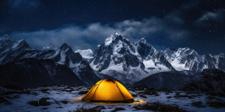 Panorama of Steep Peak mountains with covered snow and yellow tent camping at twilight timeの素材