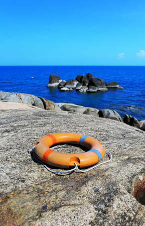 Broken Buoy on rock beach at Samui Island, Thailandの写真素材