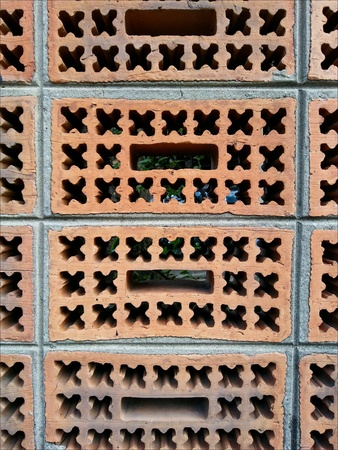 Red brick chimney blocked background.の素材