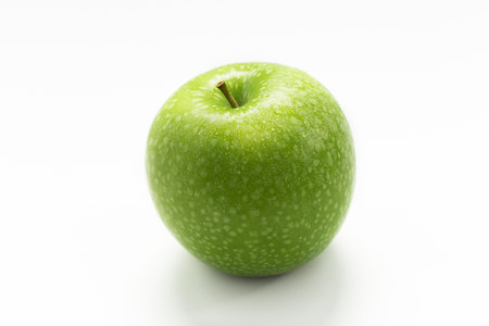Green apple on white background