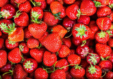 Strawberry on wood background. Strawberry with green leaves.の写真素材