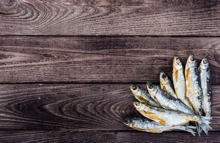 Fish dried ram,on wooden backgroundの写真素材