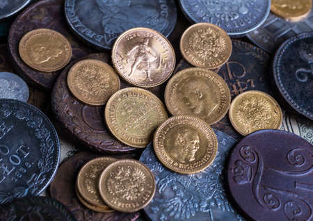 Gold and silver coins of the Russian Empire in the background kopyur.Antikvariat.の写真素材