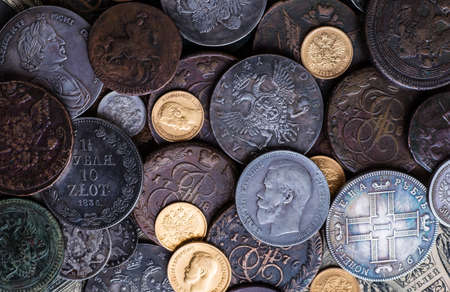 Gold and silver coins of the Russian Empire in the background kopyur.Antikvariat.の写真素材