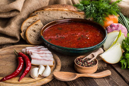 Ukrainian beetroot soup - borscht, on napkin, on wooden backgroundの写真素材