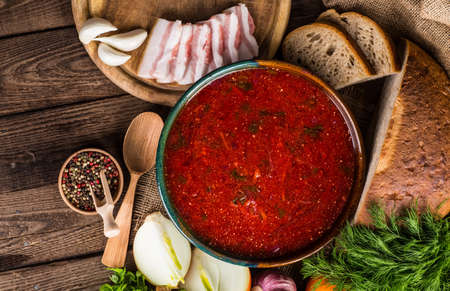 Ukrainian beetroot soup - borscht, on napkin, on wooden backgroundの写真素材