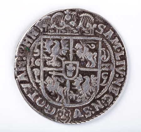 Antique silver Polish coin. King Sigismund III Vasa. Obverse. Isolated on whiteの写真素材