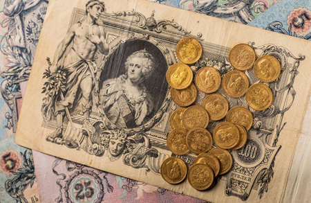 Gold and silver coins of the Russian Empire in the background kopyur.Antikvariat.の写真素材