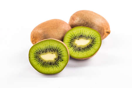 Kiwi cut segments on a white backgroundの写真素材