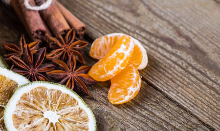 Christmas decoration from spices and fruits on christmas table.の写真素材