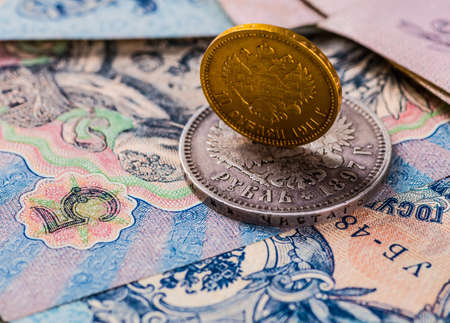 Gold and silver coins of the Russian Empire in the background kopyur.Antikvariat.の写真素材