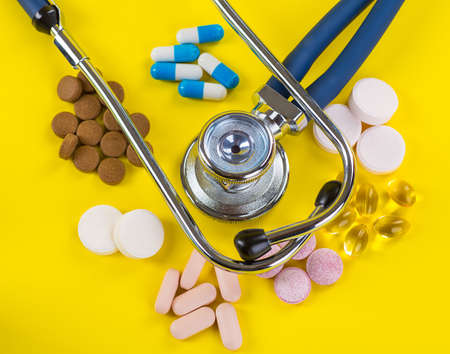 Selection of different pills in form of tablets and capsulesの写真素材