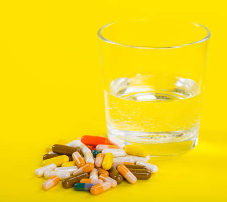 Selection of different pills in form of tablets and capsules